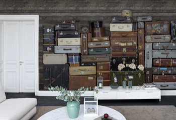 R14061 – fototapeta Stacked Suitcases Rebel Walls