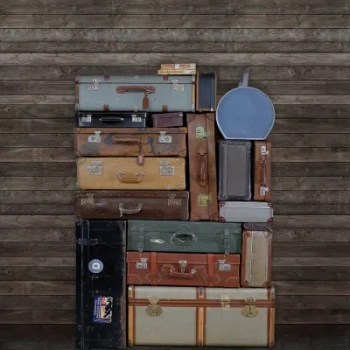 R14063 – fototapeta Stacked Suitcases, Pile Rebel Walls