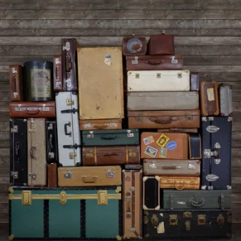 R14062 – fototapeta Stacked Suitcases, Heap Rebel Walls