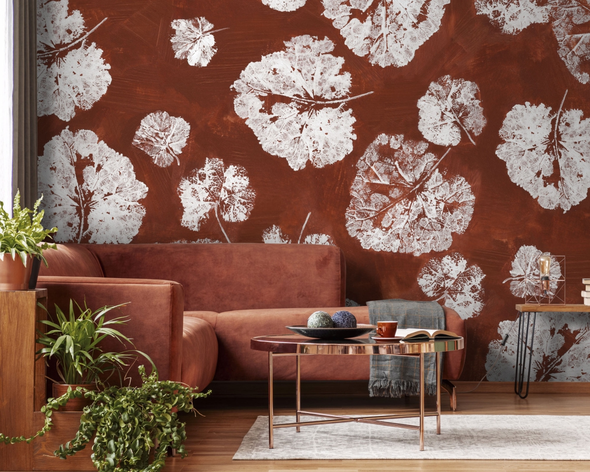 tapeta na wymiar WallArt do salonu – Foglia Rust z motywem białych liści na rdzawej czerwieni